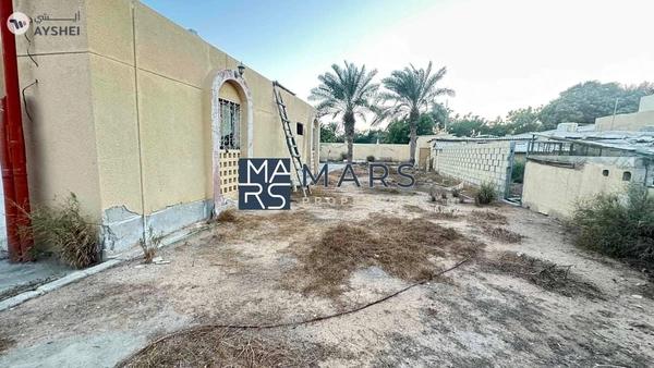 Perfectly located on Main Street residential plot 16000 sqft for sale in Al khazamia