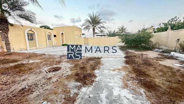 Perfectly located on Main Street residential plot 16000 sqft for sale in Al khazamia