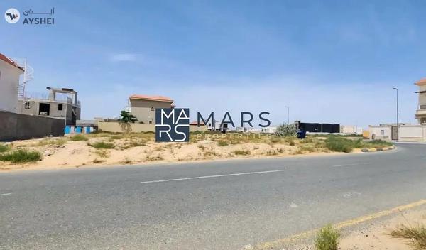 Residential corner plot in Al Hoshi